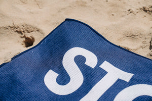 Stop New Oil & Gas beach towel from Surfers for Climate